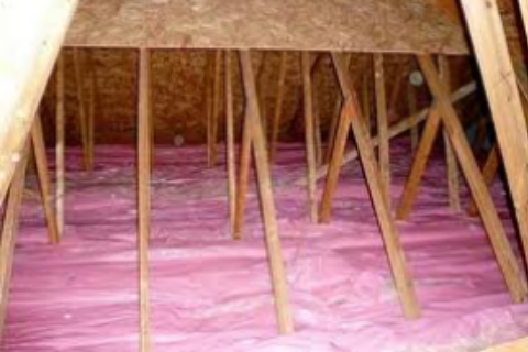 attic-filled-with-insulation new attic insulation cross support beams